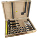 Wooden drill bit set with various drill bits and a ruler inside an open wooden box.